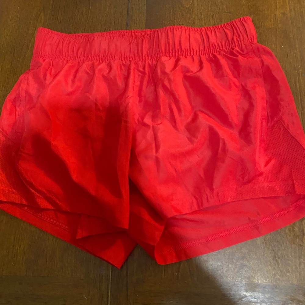 red athletic shorts